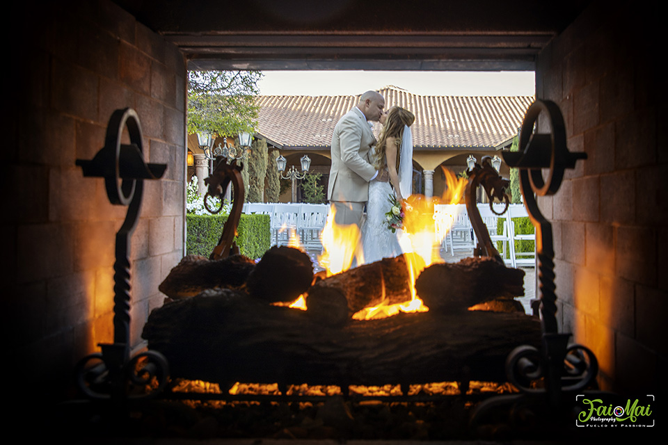 bride and groom - fireplace view